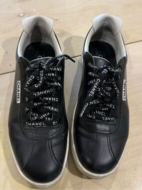 CHANEL Black and White Leather Logo Lace-Up Sneakers